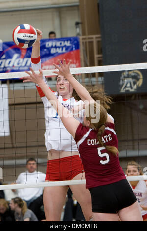 Nov. 21, 2009 - West Point, New York, U.S - 21 November 2009:  American's Claire Recht tips the ball past Colgate's Casey Ritt during game action at the Patriot League Volleyball CHampionship Semi-Finals at Gillis Field House in West Point, NY.  The Army Black Knights defeated Lehigh 3-0, while the American University Eagles defeated the Colgate Raiders3-0.  Mandatory Photo Credit: Stock Photo