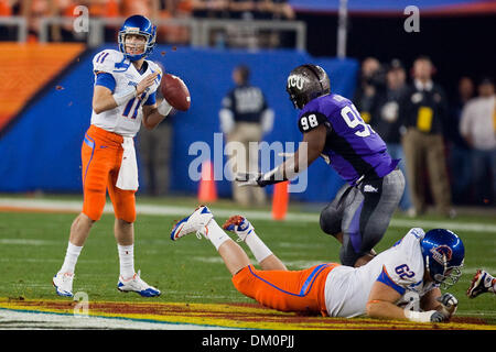 Jan. 05, 2010 - Glendal, Arizona, USA - 04 January 2010: Boise State's Kellen Moore (11) steps up into the pocket  during first half action of the 39th annual Tostitos Fiesta Bowl between the Boise State Broncos and the TCU Horned Frogs. Boise State leads 10-7 at the half. (Credit Image: © Stanley Brewster/Southcreek Global/ZUMApress.com) Stock Photo