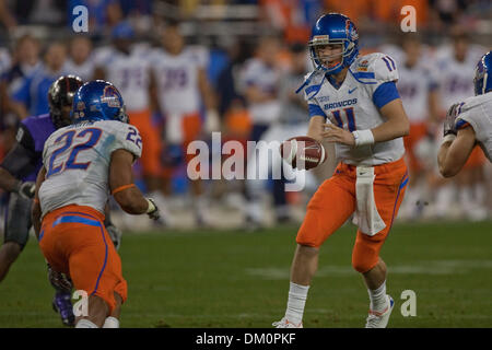 Jan. 05, 2010 - Glendal, Arizona, USA - 04 January 2010: Boise State's Kellen Moore (11) hands off to Doug Martin (22) during second half action of the 39th annual Tostitos Fiesta Bowl between the Boise State Broncos and the TCU Horned Frogs. Boise State won the game 17-10. (Credit Image: © Stanley Brewster/Southcreek Global/ZUMApress.com) Stock Photo