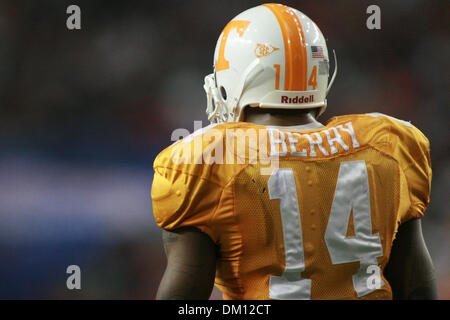 Gator running back Jeffery Demps (2) is brought down by Tennessee defenders  Jazen Jackson (L) and Eric Berry (R) in the first half of the NCAA football  game between the Tenessee Volunteers