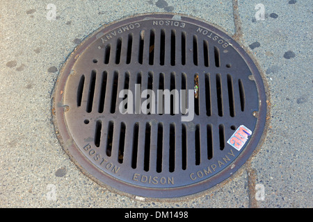Manhole cover (Boston Edison Company) in the streets of Boston, Massachusetts, USA Stock Photo