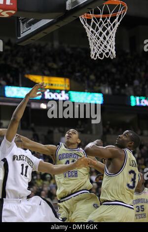 Georgia Tech forward Gani Lawal (31) shoots over Maryland forward Dino ...