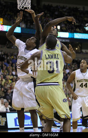 Georgia Tech forward Gani Lawal (31) shoots over Maryland forward Dino ...