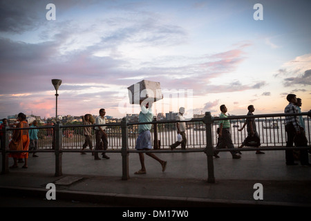 Pedestrians crossing Howrah Bridge - Calcutta (Kolkata), India Stock Photo