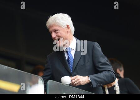 Soweto, South Africa. 10th Dec, 2013. Former US president Bill Clinton during the official memorial service for former South African President Nelson Mandela at the FNB Stadium on December 10, 2013 in Soweto, South Africa. Over 60 heads of state have travelled to South Africa to attend a week of events commemorating the life of former South African President Nelson Mandela. Mr Mandela passed away on the evening of December 5, 2013 at his home in Houghton at the age of 95. Credit:  Gallo images/Alamy Live News Stock Photo