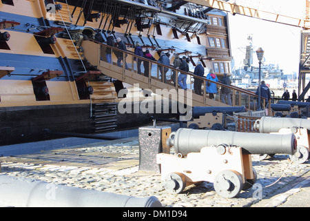 Tourists visiting Hms victory which was Admiral Lord Nelsons flagship Stock Photo