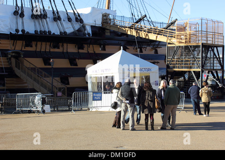 Tourists visiting Hms victory which was Admiral Lord Nelsons flagship Stock Photo