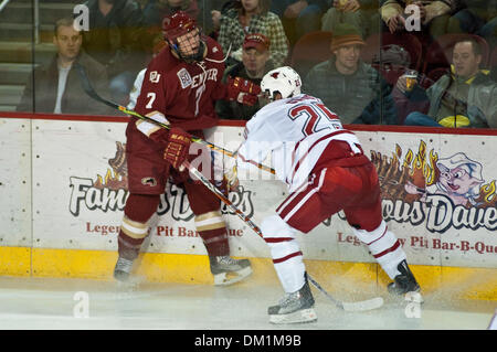 Jan. 01, 2010 - Denver, Colorado, USA - 01 January 2010:  Paul Phillips (7) prepares to be checked by Brent Gwidt (25) of the Mavericks. Nebraska at Omaha Mavericks vs. Denver Pioneers during the Wells Fargo Denver Cup at Magness Arena in Denver, Colorado..Mandatory Credit: Andrew Fielding / Southcreek Global (Credit Image: © Andrew Fielding/Southcreek Global/ZUMApress.com) Stock Photo