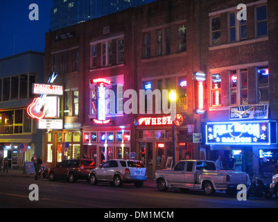 Honky tonk bars and clubs line Broadway in downtown Nashville, Tennessee Stock Photo