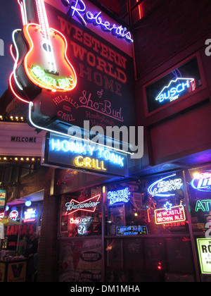 Exterior of Honky Tonk bars, lounges, and clubs and their neon signs on ...