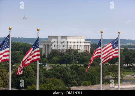 The Lincoln Memorial and US flags as seen from the Kennedy Center for the Performing Arts. Stock Photo