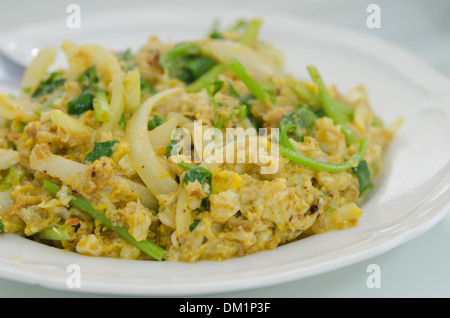 Stirred Fried Crab with Garlic, Pepper, Curry Powder and vegetable on dish Stock Photo