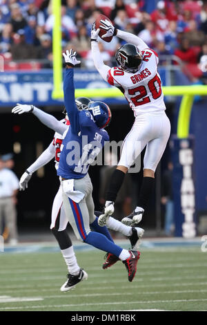 Falcons 20 Corner Back Brent Grimes up high for the ball in the game between the Atlanta Falcons and the New York Giants at Giants Stadium Rutherford New Jersey The Giants defeated