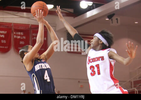 Notre Dame guard Skylar Diggins #4 at the net with St. John's guard Shenneika Smith #31. St Johns defeated Notre Dame 76-71 in the game held at Carnesecca Arena, Jamaica, New York. (Credit Image: © Anthony Gruppuso/Southcreek Global/ZUMApress.com) Stock Photo