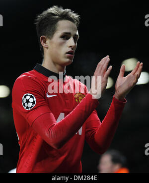 Manchester, UK. 10th Dec, 2013. Adnan Januzaj of Manchester United greets spectators after the UEFA Champions League Group A match between Manchester United and Shakhtar Donetsk at Old Trafford Stadium in Manchester, Britain on Dec. 10, 2013. Manchester United won 1-0. Credit:  Wang Lili/Xinhua/Alamy Live News Stock Photo