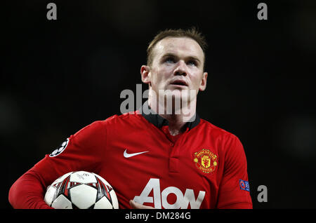 Manchester, UK. 10th Dec, 2013. Wayne Rooney of Manchester United looks on during the UEFA Champions League Group A match between Manchester United and Shakhtar Donetsk at Old Trafford Stadium in Manchester, Britain on Dec. 10, 2013. Manchester United won 1-0. Credit:  Wang Lili/Xinhua/Alamy Live News Stock Photo