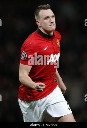 Manchester, UK. 10th Dec, 2013. Phil Jones of Manchester United celebrates scoring during the UEFA Champions League Group A match between Manchester United and Shakhtar Donetsk at Old Trafford Stadium in Manchester, Britain on Dec. 10, 2013. Manchester United won 1-0. Credit:  Wang Lili/Xinhua/Alamy Live News Stock Photo