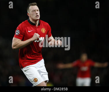 Manchester, UK. 10th Dec, 2013. Phil Jones of Manchester United celebrates scoring during the UEFA Champions League Group A match between Manchester United and Shakhtar Donetsk at Old Trafford Stadium in Manchester, Britain on Dec. 10, 2013. Manchester United won 1-0. Credit:  Wang Lili/Xinhua/Alamy Live News Stock Photo