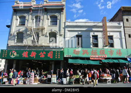 locals shop for groceries on Stockton street in Chinatown San Francisco Stock Photo