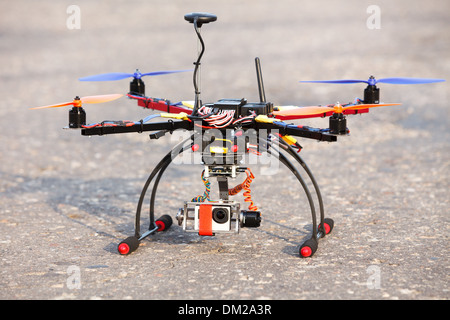 Multicopter with camera in brushless gimbal and autopilot ready for take-off Stock Photo