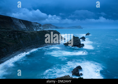 Mupe Bay at dawn on a rough winter morning, Jurassic Coast, Dorset, England