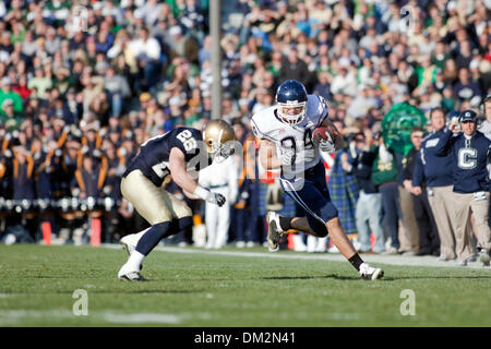 University of Connecticut at University of Notre Dame; Kyle McCarthy tackles Connecticut wide receiver Ryan Griffin following a reception;   Notre Dame Stadium; South Bend, IN (Credit Image: © John Korduner/Southcreek Global/ZUMApress.com) Stock Photo