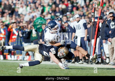 University of Connecticut at University of Notre Dame; Kyle McCarthy tackles Connecticut wide receiver Ryan Griffin following a reception;   Notre Dame Stadium; South Bend, IN (Credit Image: © John Korduner/Southcreek Global/ZUMApress.com) Stock Photo