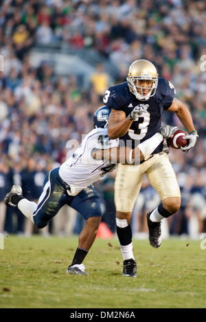 University of Connecticut at University of Notre Dame; Connecticut defensive back Robert McClain strips the ball from Michael Floyd;  Notre Dame Stadium; South Bend, IN (Credit Image: © John Korduner/Southcreek Global/ZUMApress.com) Stock Photo