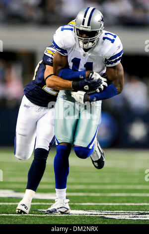 Houston Texans cornerback Glover Quin (29) tackles Dallas Cowboys wide  receiver Roy E. Williams (11) in the first half of their preseason game  Saturday, August 28, 2010, at Reliant Stadium in Houston