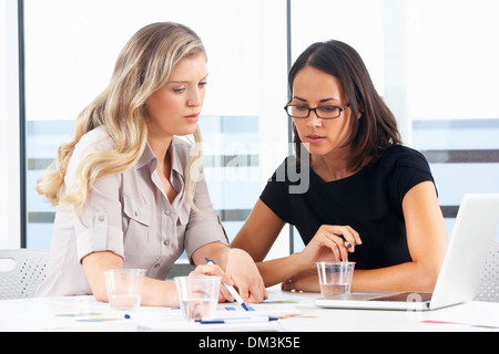 Two Businesswomen Meeting In Office Stock Photo