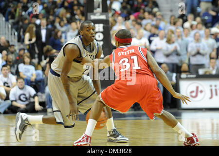 Washington D.C. Verizon Center. .Georgetown guard Jason Clark (21) facing St. John's guard Malik Stith (31), game action in the first half. Georgetown and Harvard were tied at 33 with 3 1/2 minutes left in the first half before the Hoyas took control at both ends of the court to go up 44-33 at halftime. Hoyas defeat Harvard 86-70  (Credit Image: © Roland Pintilie/Southcreek Global/ Stock Photo