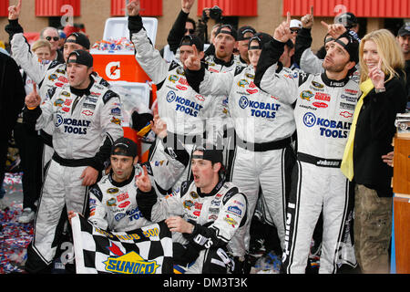 21 February 2010: Jimmie Johnson his wife Chandra Johnson (far right) and crew members celebrate after winning the Auto Club 500 at the Auto Club Speedway in Fontana, California. Mandatory Credit: Brandon Parry / Southcreek Global (Credit Image: © Brandon Parry/Southcreek Global/ZUMApress.com) Stock Photo