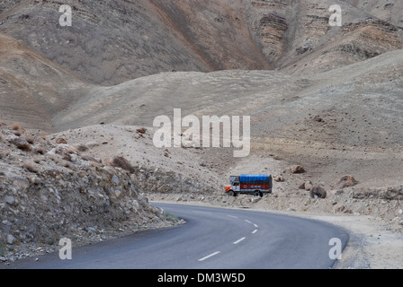 Ladakh, India - 14 July 2009: a colorful lorry runs on the winding roads of Ladakh Stock Photo