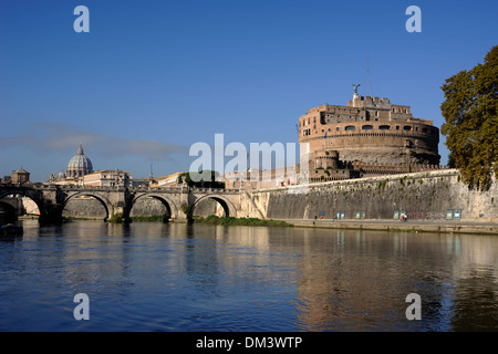 Italy, Rome, Tiber river, Castel Sant'Angelo, bridge and St Peter's basilica Stock Photo
