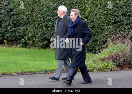 Altrincham, Cheshire, UK. 11th December 2013. Denis Law, former Manchester United player, and Mike Summerbee, former Manchester City player attend the funeral of Bill Foulkes, who died on November 25th. Bill was one of the Busby Babes, who survived the Munich air crash in February 1958  was captain and played 688 times for Manchester United. Bill Foulkes Funeral  Altrincham  Cheshire  11 December 2013 Credit:  John Fryer/Alamy Live News Stock Photo