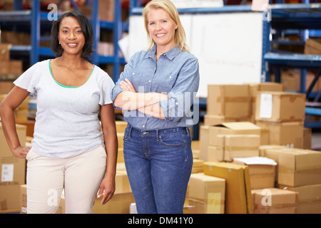 Portrait Of Workers In Distribution Warehouse Stock Photo