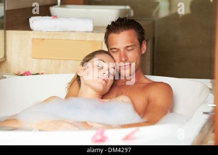 Couple Relaxing In Bubble Bath Together Stock Photo