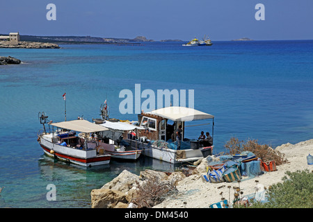 FISHING BOATS & BLUE WATER KARPAS PENINSULA NORTHERN CYPRUS 26 May 2013 Stock Photo