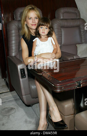 June 24, 2002 - Los Angeles, CALIFORNIA - JOHN TRAVOLTA BECOMES QANTAS AMBASSADOR-AT-LARGE.AT LAX AIRPORT IN LOS ANGELES, CA.KELLY PRESTON AND DAUGHTER ELLA BLEU INSIDE THEIR.AIRPLANE. FITZROY BARRETT /    6-24-2002        K25384FB         (D)(Credit Image: © Globe Photos/ZUMAPRESS.com) Stock Photo