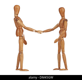 Wooden dummies shaking hands, Cooperation of business Stock Photo