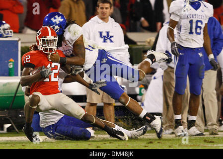 Georgia wide receiver Tavarres King (12) is tackled after a catch at the game against Kentucky at Sanford Stadium at the University of Georgia in Athens, Ga., on Saturday, November 21, 2009. The Wildcats beat the Bulldogs 34-27. (Credit Image: © Daniel Shirey/Southcreek Global/ZUMApress.com) Stock Photo