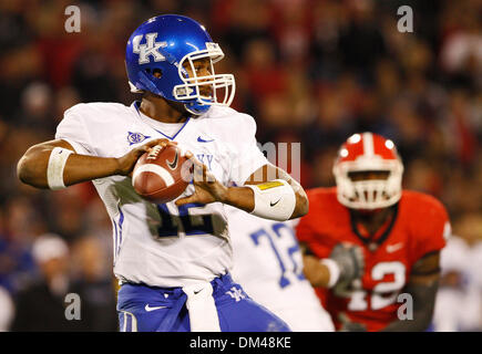 Kentucky quarterback Morgon Newton (12) drops back to pass at the game against Georgia at Sanford Stadium at the University of Georgia in Athens, Ga., on Saturday, November 21, 2009.  The Wildcats beat the Bulldogs 34-27. (Credit Image: © Daniel Shirey/Southcreek Global/ZUMApress.com) Stock Photo