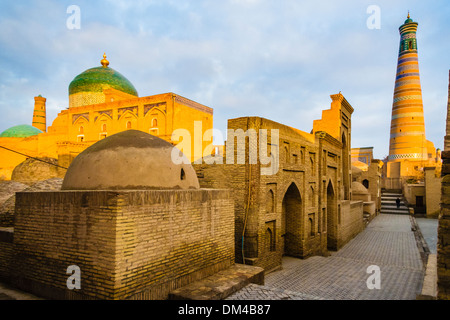 Islam-Khodja madrassa minaret and buildings around. Khiva, Uzbekistan Stock Photo