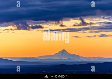 Orange sky over Mt. Hood seen during sunset from Bend, Oregon Stock Photo