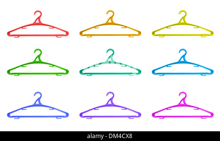 Plastic hangers of various colours over white background Stock Photo