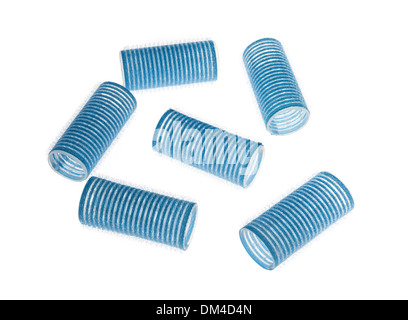 Blue hair curlers isolated over white background Stock Photo