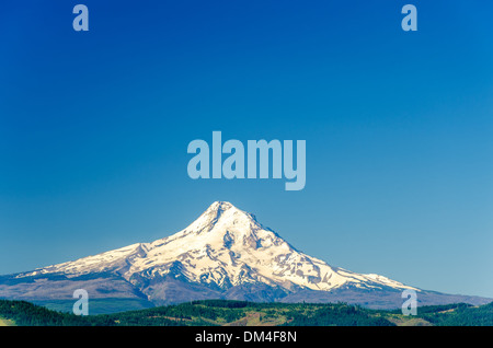 Beautiful snow covered Mt. Hood and a deep blue sky in Oregon, USA Stock Photo