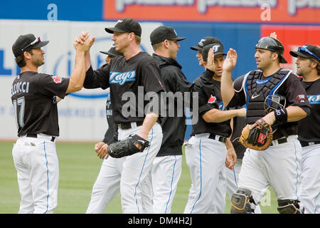 Roy ''Doc'' Halladay and the Toronto Bue Jays celebrate their 3-1 victory over the Boston Red Sox. Halladay earned his 11th victory of the season, at the Rogers Centre, Toronto. (Credit Image: © Terry Ting/Southcreek Global/ZUMApress.com) Stock Photo