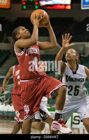 19 December 2009:  Indiana Hoosiers Ashlee Mells (4) drives past Cleveland State Vikings Stephanie Crosley (25) during the NCAA college basketball game between the Indiana Hoosiers and the Cleveland State Vikings at the Wolstein Center on the campus of Cleveland State University in Cleveland, Ohio.  Cleveland State defeated Indiana in overtime 77-75. .Mandatory Credit: Frank Jansky Stock Photo