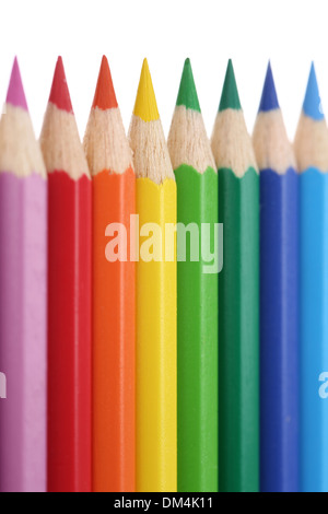 Colored pencils in a row, isolated on a white background Stock Photo